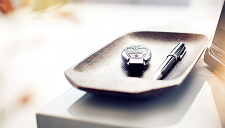 Key fob and pen on desk